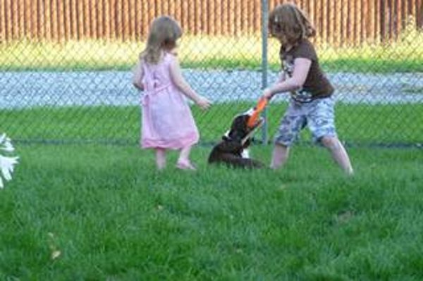 Maddy playing frisbee with the grandchildren